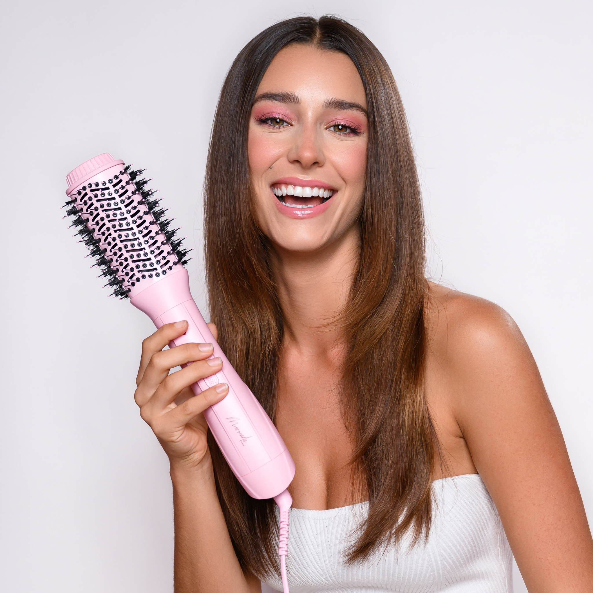 Model using the Blow Dry Brush - Signature Pink